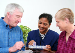 an elderly couple and their companion